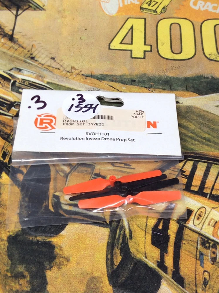 Drone propeller set with orange/red blades in retail box