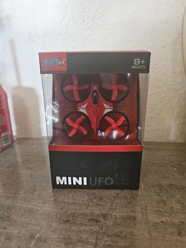 Mini Ufo 2.4G quadcopter toy box with red drone graphic