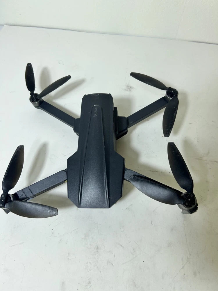 Black quadcopter drone with four foldable propellers and central body
