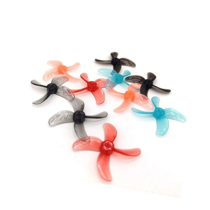 Quad-blade FPV drone propellers, mixed colors: black, red, blue, clear