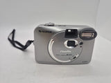 Fujifilm FinePix A101 digital camera for parts or repair, silver compact body with lens cover