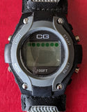 CG sport watch LCD with 100FT display, dark gray round case and black fabric strap