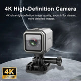 4K action camera with square body, front lens, and suction-mount base, black/gray