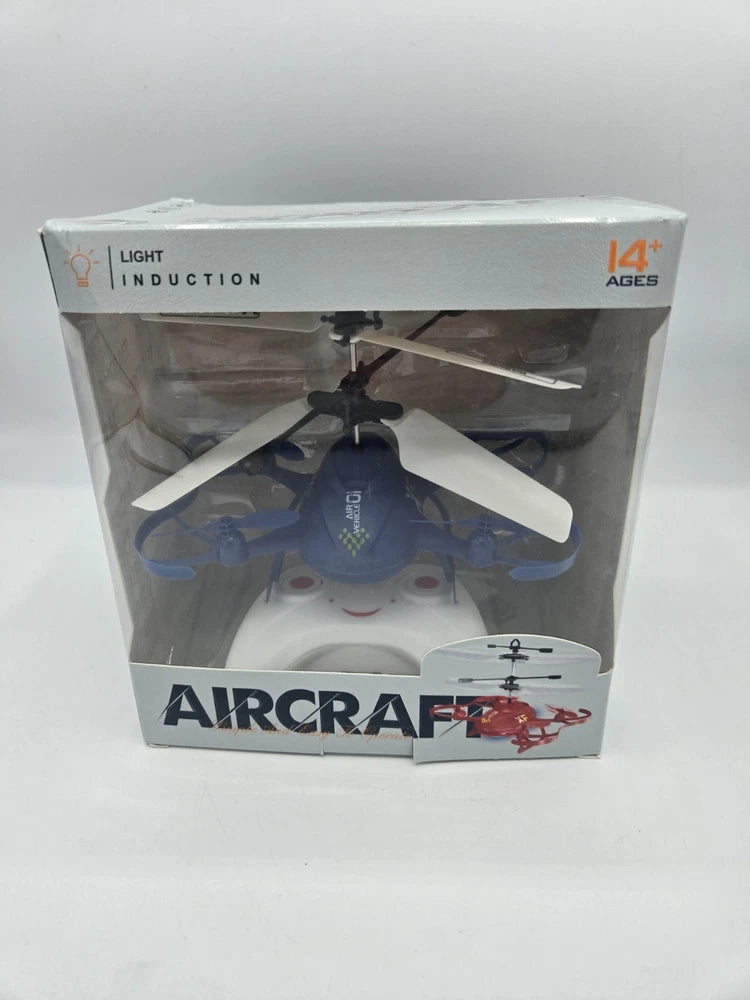 Blue induction RC helicopter drone toy with lights, in retail box, age 14+