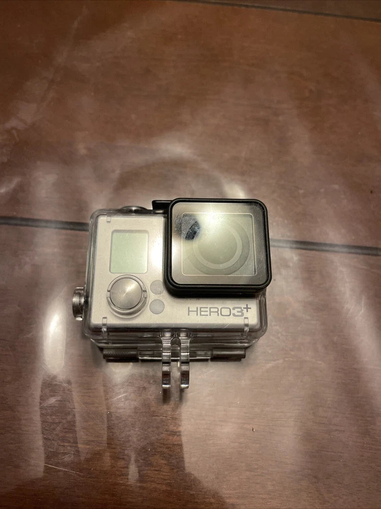GoPro HERO3+ action cam in clear waterproof housing with front LCD and lens