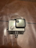 GoPro HERO3+ action cam in clear waterproof housing with front LCD and lens