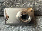 Fujifilm FinePix F20 6.3MP Super CCD sensor camera. Untested for parts.