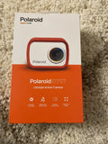 Polaroid iD757 lifestyle action camera box with red frame and lens