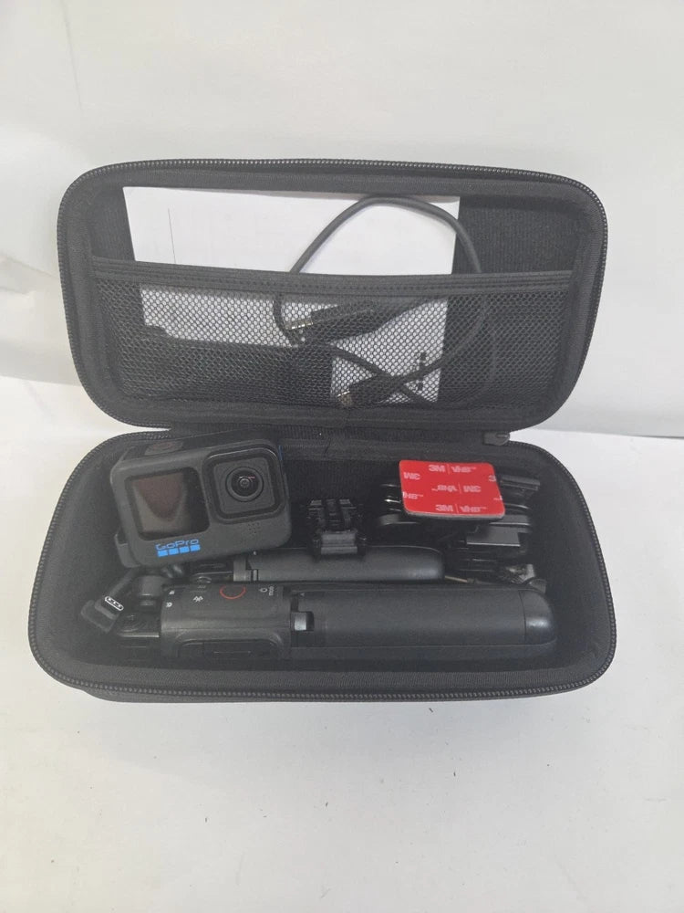 GoPro HERO10 Black action camera kit in black zip case with mounted accessories