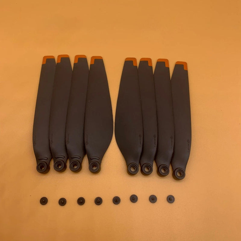 Set of 8 black drone rotor propeller blades with small mounting pins