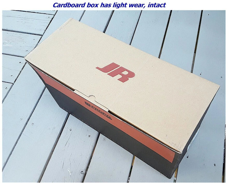 RC helicopter body canopy in cardboard shipping box with red JR logo