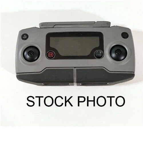 Gray DJI drone controller with screen, dual joysticks, and buttons