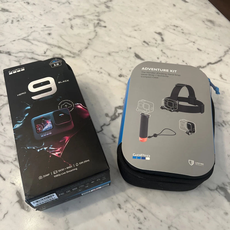 GoPro HERO9 Black camera and Adventure Kit retail boxes, sealed in packaging