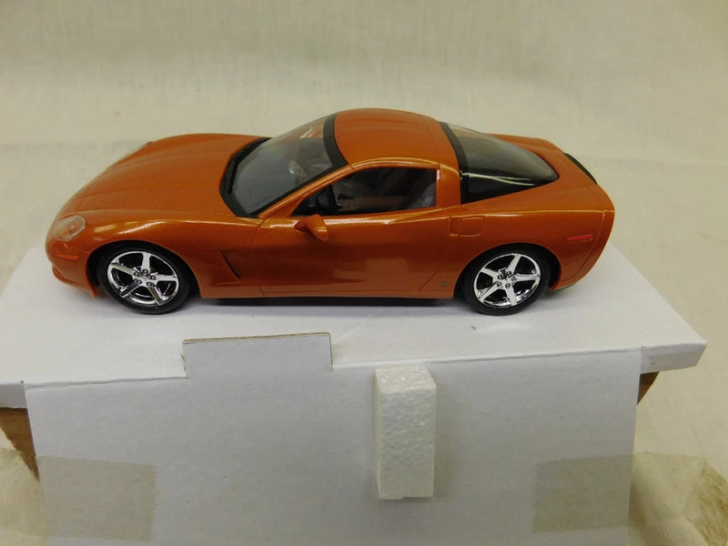 NEW AMT 1/25 SCALE 2007 CORVETTE IN ORANGE  COUPE    PROMO MODEL ERTL