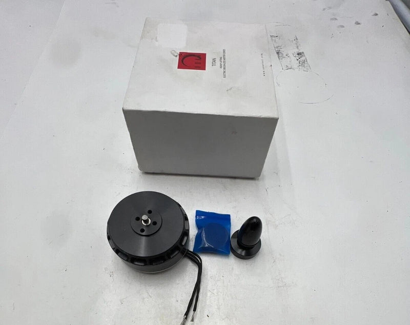 XOAR Titan brushless motor, black circular unit with wires and mounting hardware