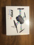 Foldable drone in retail box, gray body with multicolor LED light strips