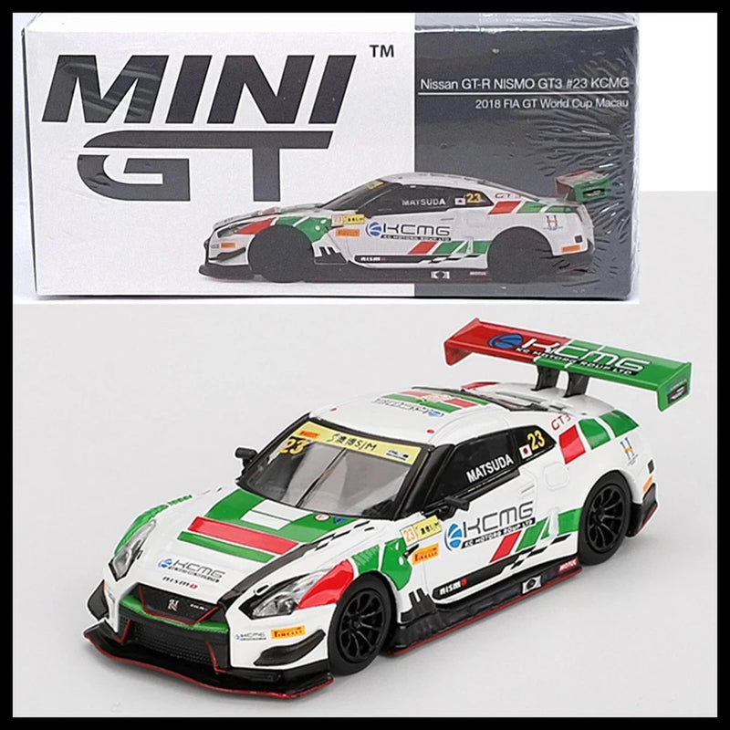 1/64 die-cast race car model in white, green and red with black wheels and rear wing