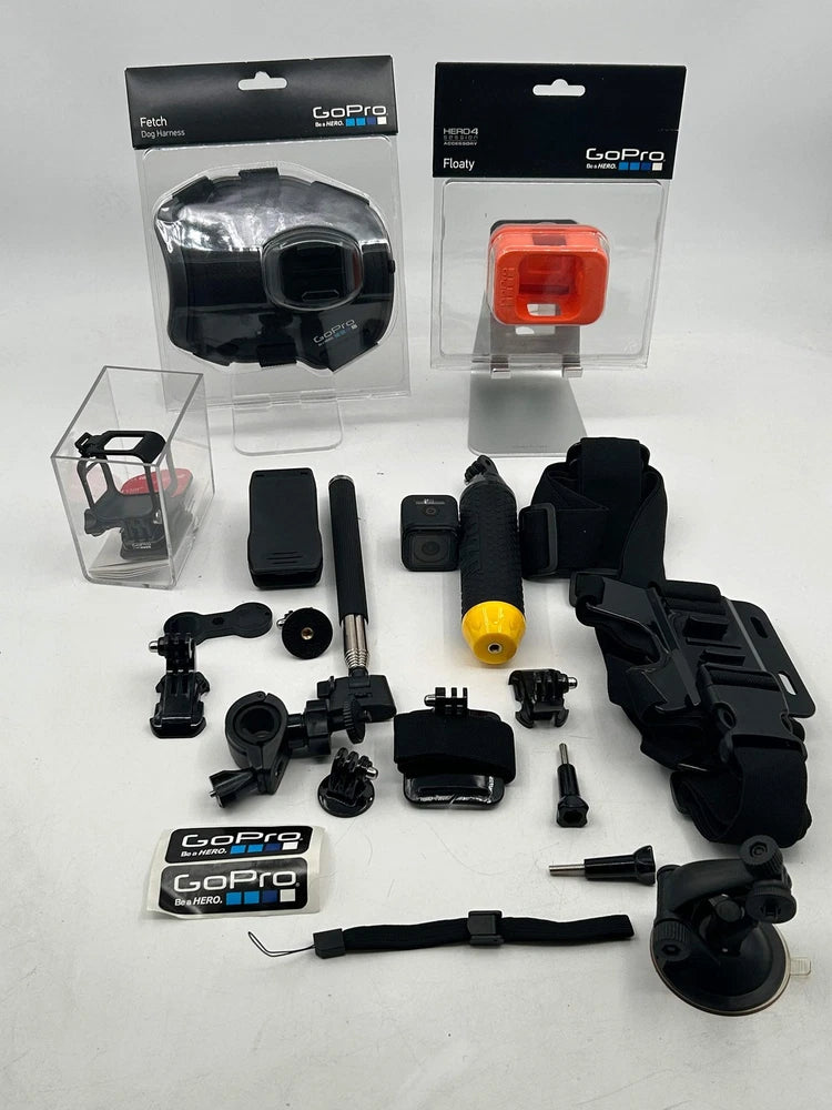 GoPro HERO4 Session action camera bundle with black camera, mounts, waterproof case, and accessories