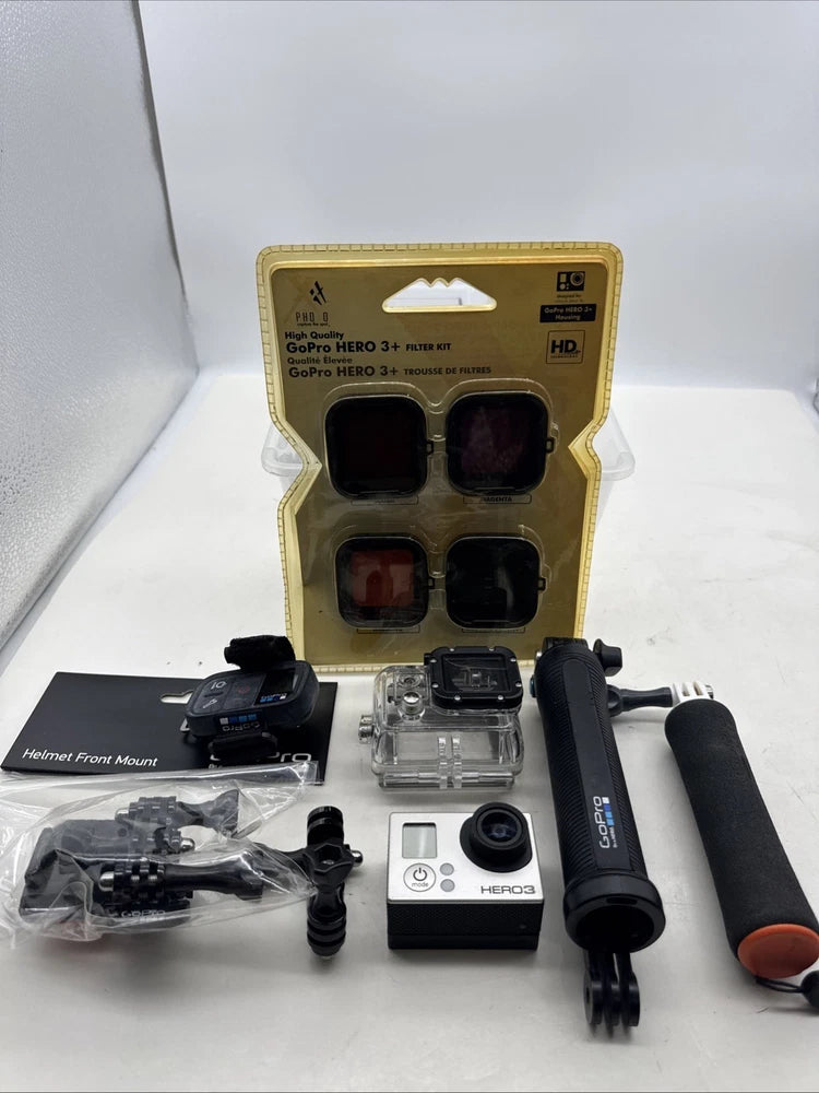 GoPro HERO3+ Silver action camera kit with mounts, waterproof housing, and handle grip