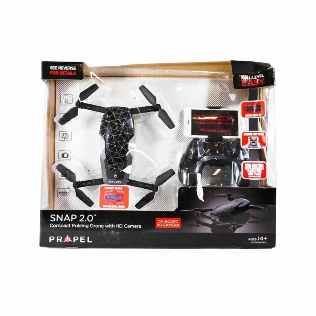 Compact folding quadcopter drone with HD camera in retail box