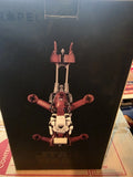 Red and white remote control quadcopter drone toy on retail box