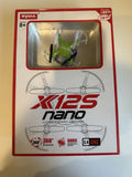 Nano quadcopter drone in retail box with green propellers