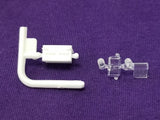 Model battery and washer bottle parts with white hoses and small clear fittings