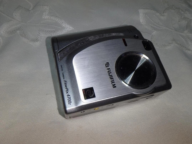 Fujifilm FinePix compact digital camera with silver body and black lens