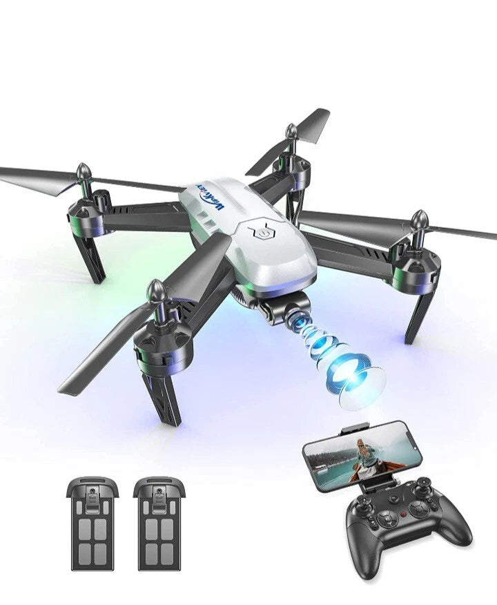 Quadcopter drone with camera, four rotors, control remote and smartphone holder