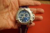 Invicta Subaqua Noma III Lady wristwatch with blue dial, silver bezel, dark maroon strap