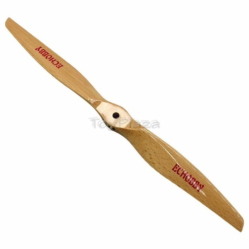 Wooden RC drone propeller blade with central hub hole and printed markings