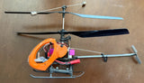 Electric micro R/C helicopter with orange body, black skids, two-blade rotor