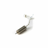 Cylindrical INDUCTRIX motor with metal body, front shaft, and white wire leads