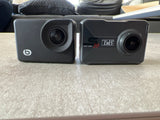 Sport camera pack: two compact dark cameras with front lenses