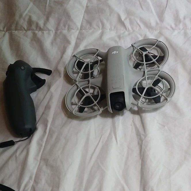 DJI Neo ready-to-fly drone with gray prop guards and black motion controller