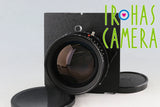 Black camera lens with front glass and mount, includes lens cap and hood