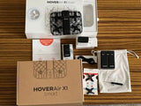 Smart drone kit box with drone, controller, cable, and storage pouch