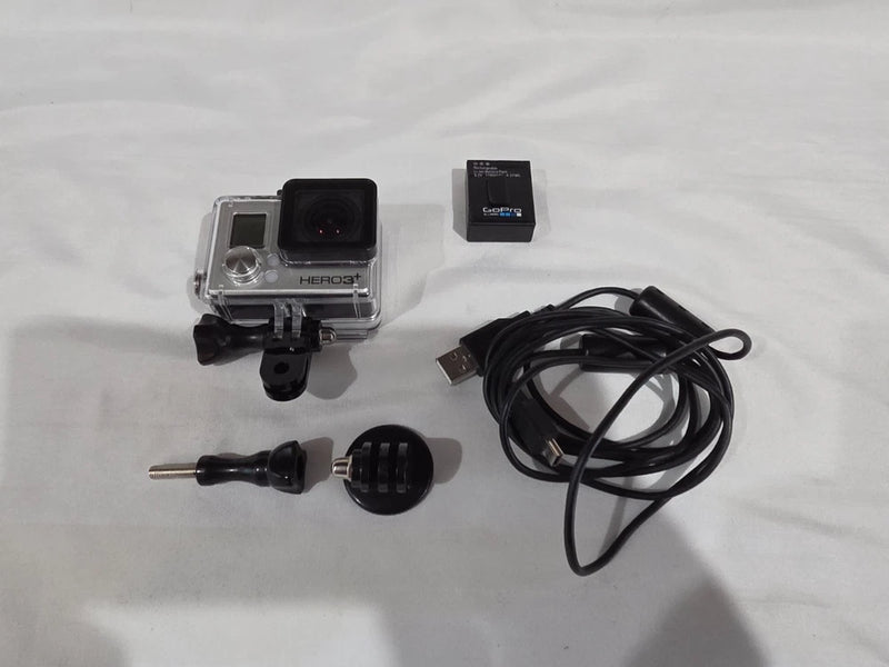 GoPro action camera in clear case with mount, battery, and USB cable