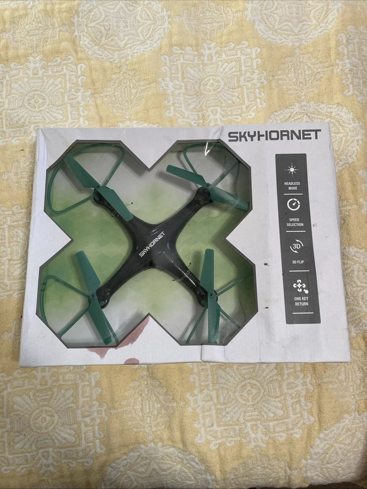 Skyhornet remote control drone toy box with green quadcopter