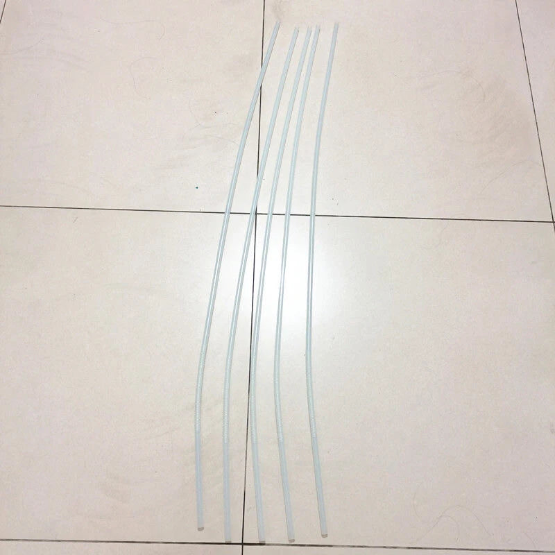Spray hose line with four slender light-blue tubes
