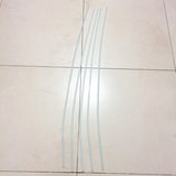 Spray hose line with four slender light-blue tubes