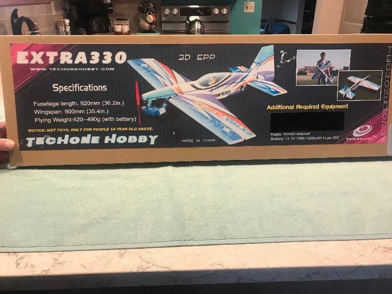 330 RC aerobatic airplane ARF kit box with multicolor plane artwork
