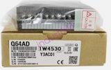 Mitsubishi Q64AD converter module with terminal block and box label 064AD