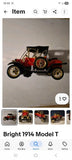 Battery-operated vintage Model T bumper toy car, red and black with open top