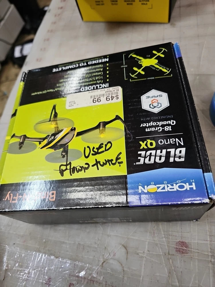 Nano RC drone retail box with yellow and black drone graphics