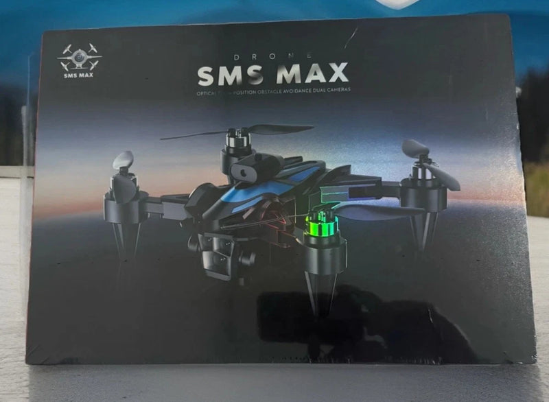 Quadcopter drone on product box, showing 4K camera and obstacle avoidance graphics