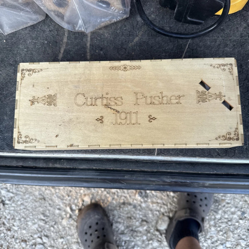 Beige ornate label with 'Curtiss Pusher 1911 &'