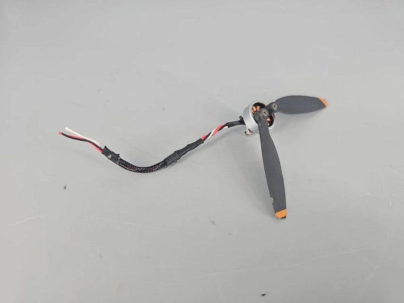 Drone motor repair assembly with prop blade, motor housing, and connector wires