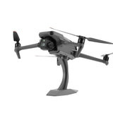 Desktop drone display bracket rack with mounted quadcopter drone