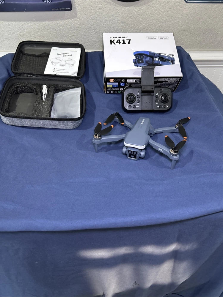FPV drone kit with dual cameras, remote controller, and carrying case
